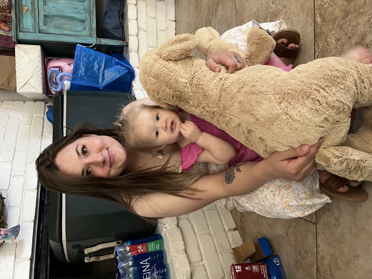 Soraya holding a baby