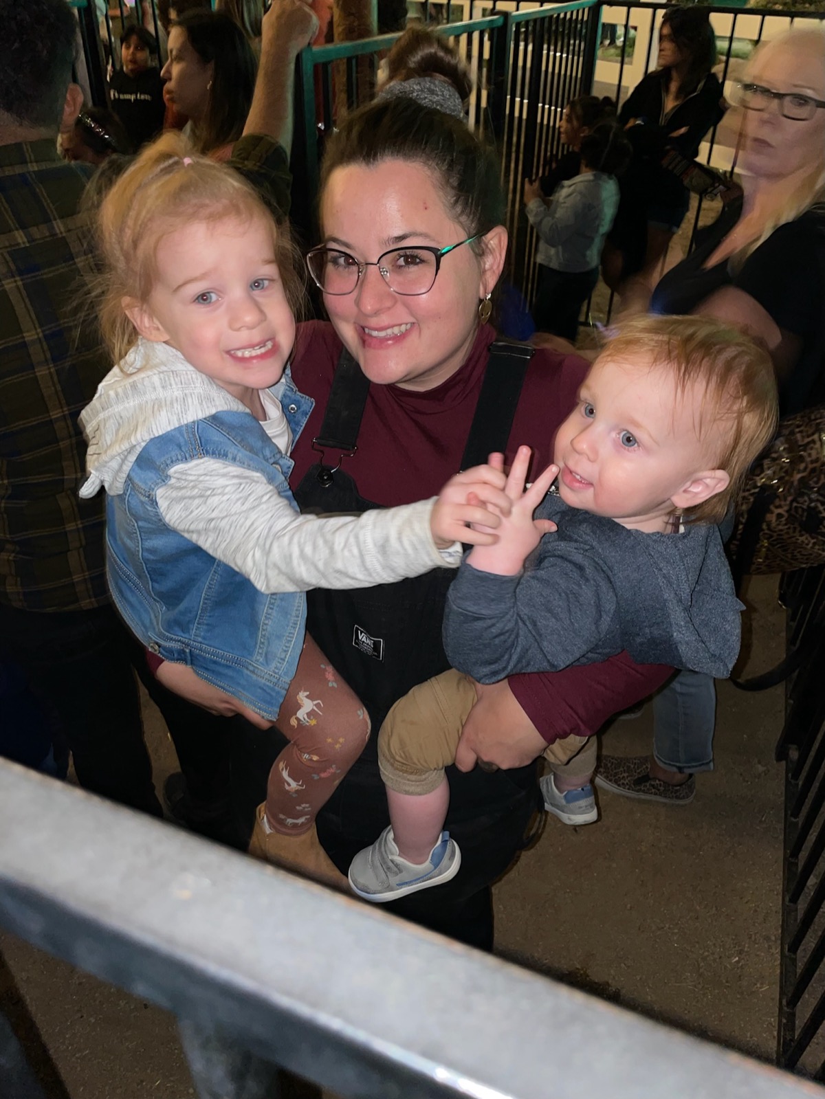 Soraya holding two children